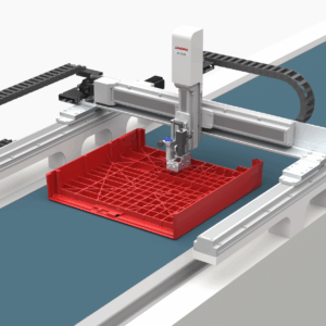 Robot cartesiano JANOME Serie JC3 realizando tareas de ensamblaje automatizado